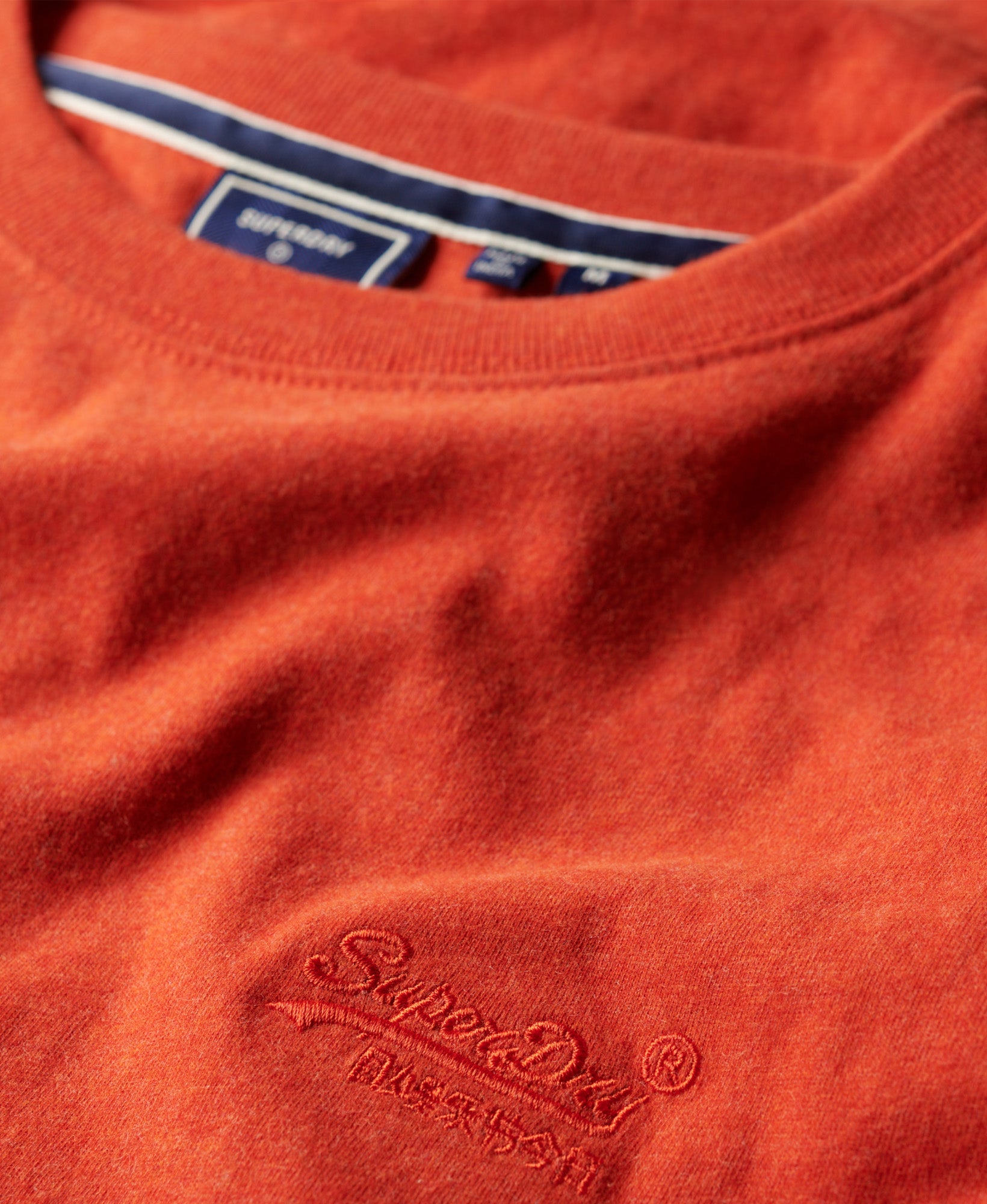Essential Logo Embroidered Tee | Bright Orange Marle