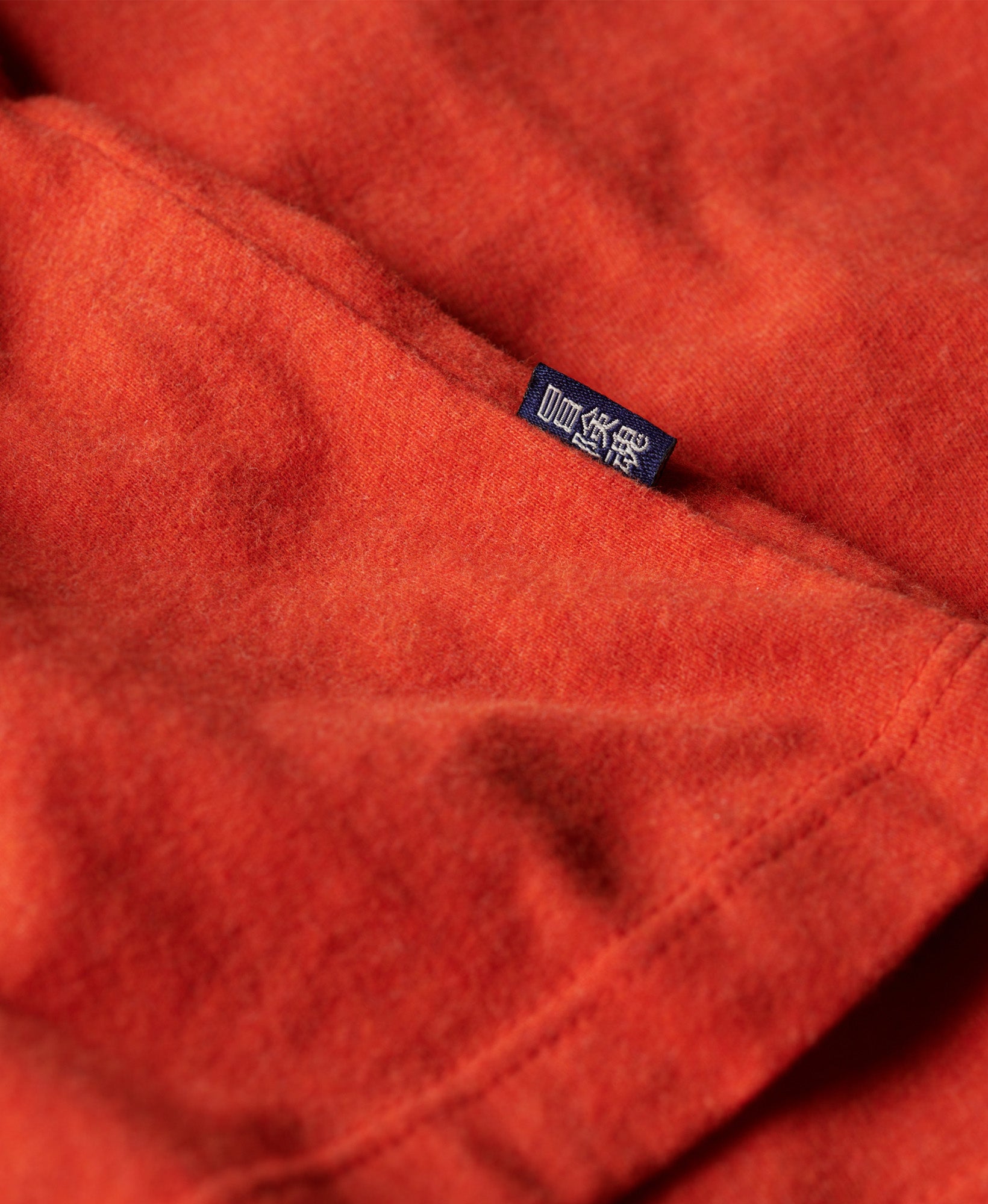 Essential Logo Embroidered Tee | Bright Orange Marle